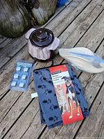 Group shot showing all four items on wooden deck