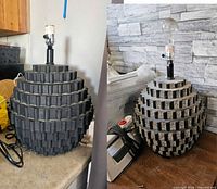 Both spherical stacked-block lamps shown from front and side on countertop
