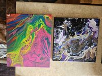 Both paintings side by side showing overall designs and colours