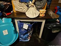 Table with dark top and white legs