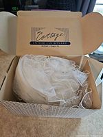 Veil inside branded box showing packaging