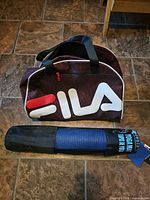 Overall view of Fila gym bag and North 49 yoga mat