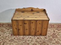 Front view of wooden chest closed