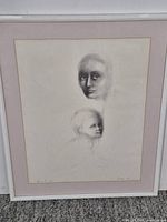 Full view of framed lithograph with frame and mat visible