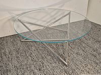 full view of the round glass cocktail table