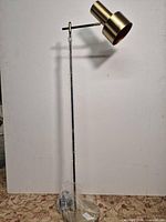 Full view of floor lamp assembled, plastic on pole