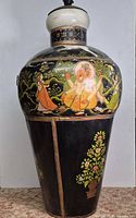 Full view of urn showing Ganesha scene and floral basket