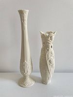 Front view of both Lenox ivory porcelain bud vases