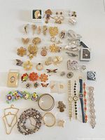 All jewelry items arranged on table for overview