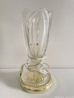 Full view of clear glass tulip lamp