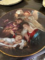 Front view of plate showing nativity artwork and gold rim