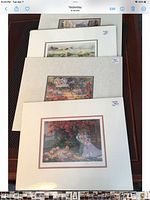 Front view of four matted art card prints stacked