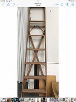 Full view of wooden ladder showing height and steps