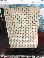 Front cover patterned boards on display stand