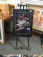 Full view of framed Montblanc poster on easel