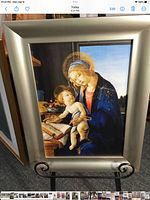 Full view of framed Botticelli print on stand