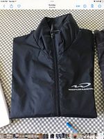 Jacket folded front view showing color and Whistler Blackcomb logo