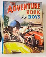 Front cover showing title and racing car illustration