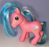 Right side view of pink My Little Pony showing cutie mark, mane and tail