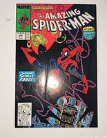 Front cover of The Amazing Spider-Man #310 comic showing artwork and issue details