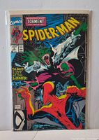 Front cover of Spider-Man #2 comic in bag and board
