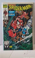 Front cover of Spider-Man #5 comic in bag and board