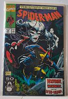 Front cover of Spider-Man #10 comic in bag and board