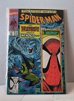 Front cover of Spider-Man #11 comic in bag with board