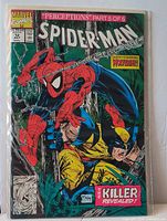 Front cover of Spider-Man #12 comic in bag and board