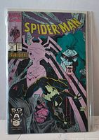Front cover of bagged Spider-Man #14 comic