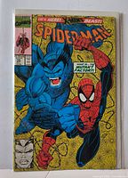Front cover of Spider-Man #15 comic in protective sleeve