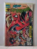 Front cover of Spider-Man #16 comic in protective bag