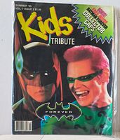 Front cover showing Batman and Riddler, publication details and collector cards promo