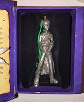 Metal Ron Weasley ornament in box with green ribbon