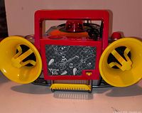 Front view showing speakers, graphic panel, handle and overall condition