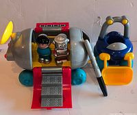 Rocket, buggy, astronaut and robot visible