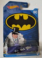 Front view of sealed Hot Wheels The Penguin Screamliner car on card