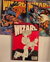 Three Wizard magazines laid out showing covers