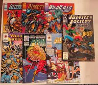 Seven comics fanned out showing full covers