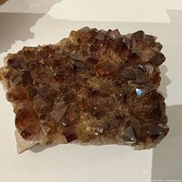 Top view of dark amber-brown quartz cluster