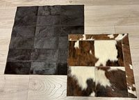 Both natural hide mats side by side showing color and size contrast