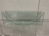 Front view of clear glass ribbon vase