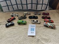 Group view of all thirteen vehicles on towel