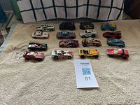 Group shot of all die-cast cars on towel