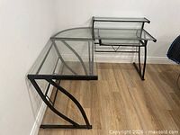 overall view of assembled L-shaped glass desk