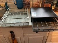 Both slide-out drawers side by side on countertop
