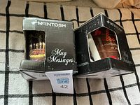 Both boxed McIntosh Mug Messages mugs