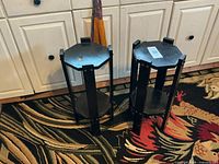 Both wooden plant stands front view