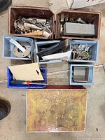 Overview of bins with assorted hardware