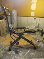 Side view of gray DP Folding Iron Horse folding rowing machine